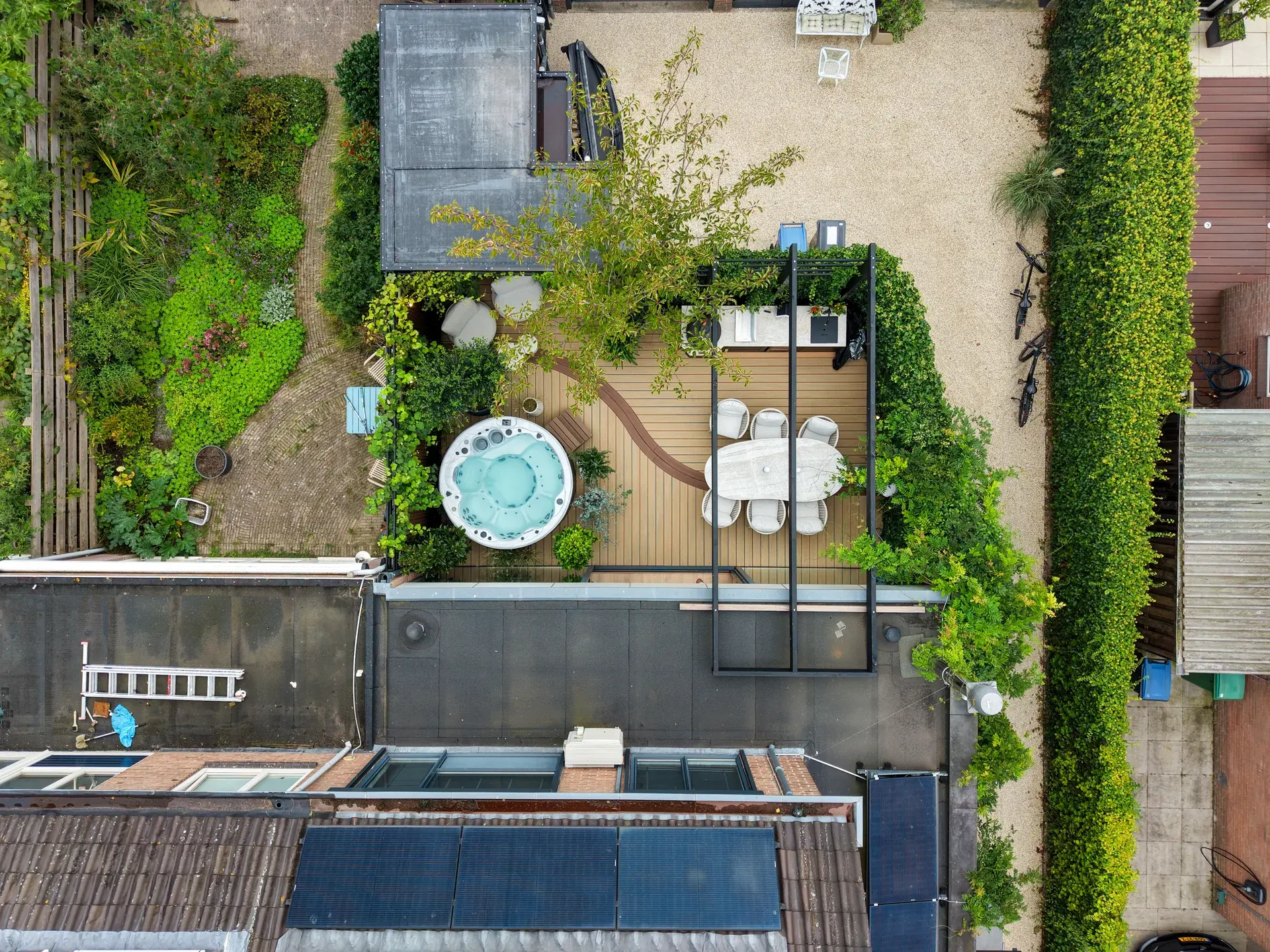 An aerial view of the spa, sauna and curved decking
