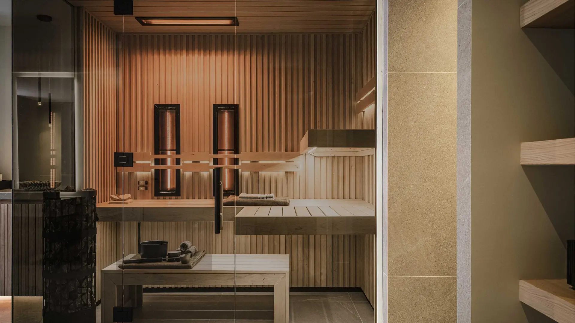 Sauna in warm wood with ambient lighting
